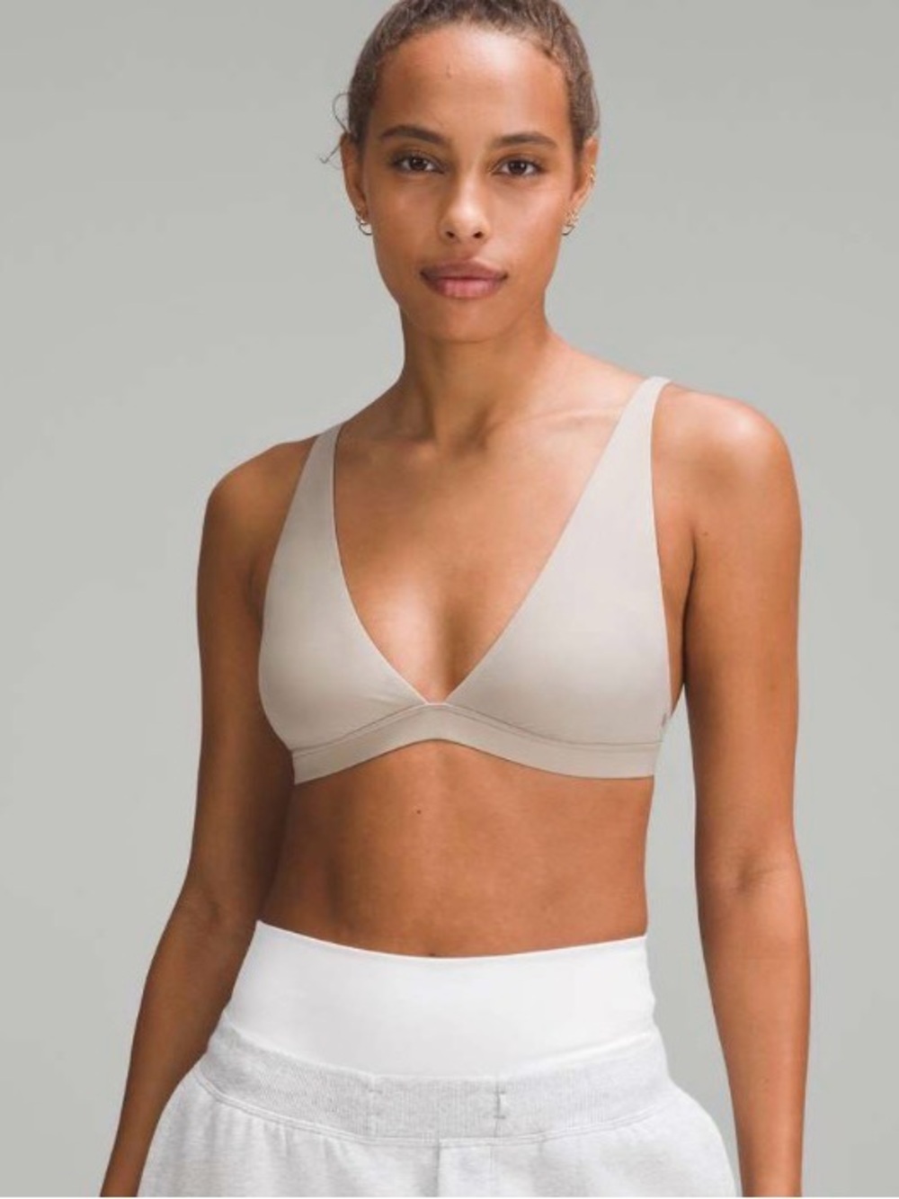 NWNT Lululemon sports bra with the wordmark
